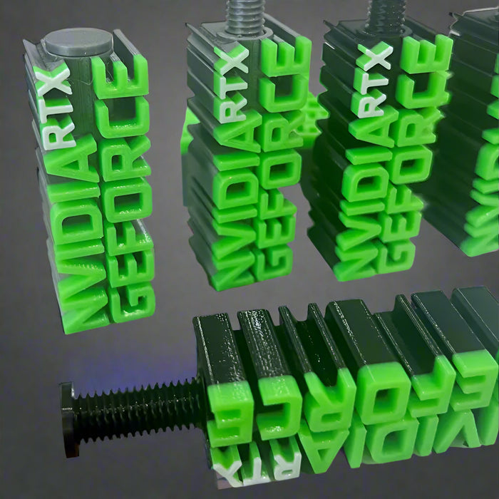 NVIDIA GeForce graphics card heatsinks with green text on a reflective surface.