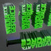 NVIDIA GeForce graphics card heatsinks with green text on a reflective surface.
