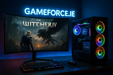 witcher IV game playing on curved monitor on desk rgd midi tower pc powered by Intel Core i9 14900k processor with Intel logo. Gameforce.ie logo on wall behind pc